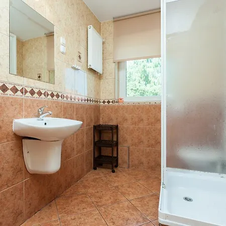 Quarto em Acomodações Particulares Amber Tiger Pobierowo